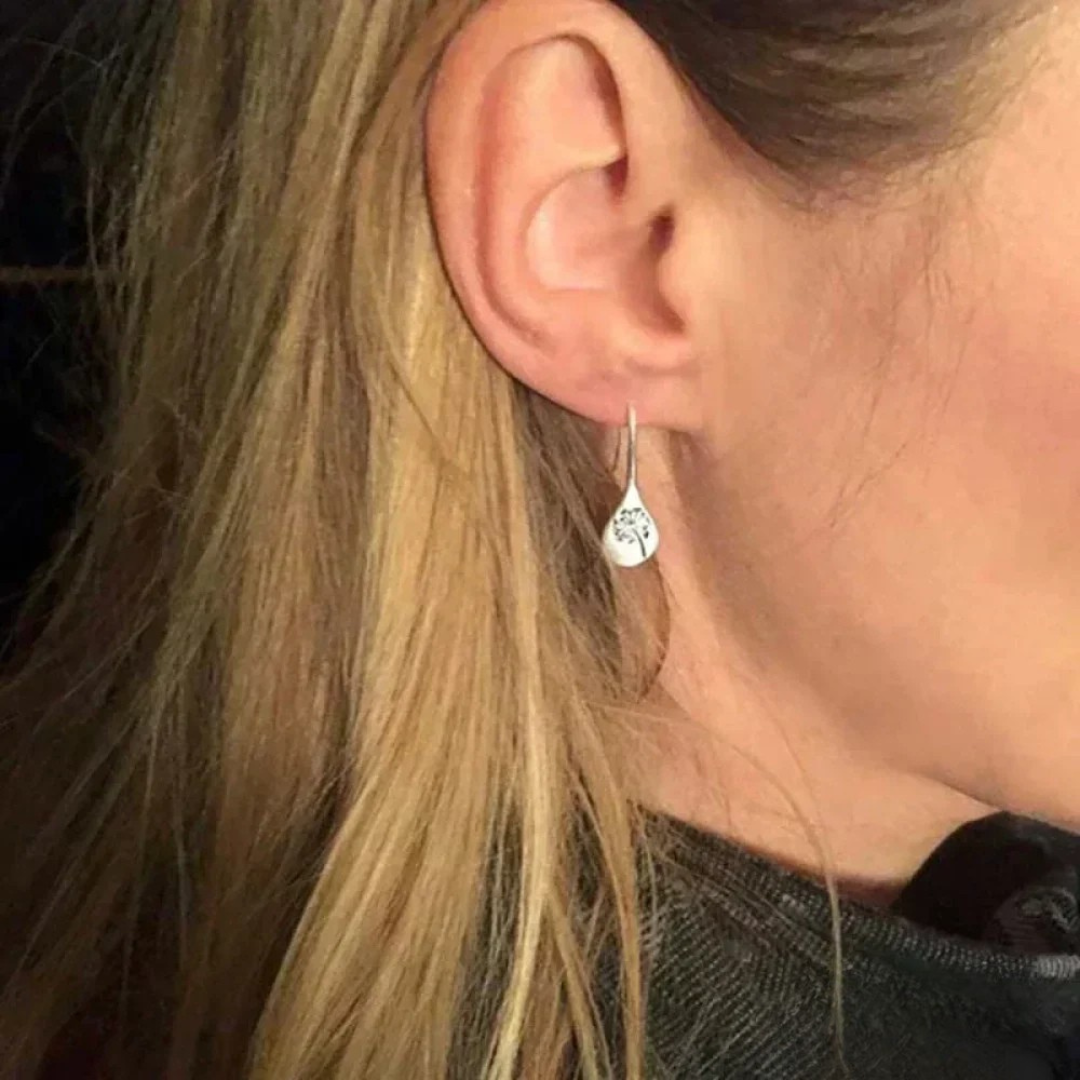 Elegant Silver Earrings Inspired by the Leaves of Dandelions