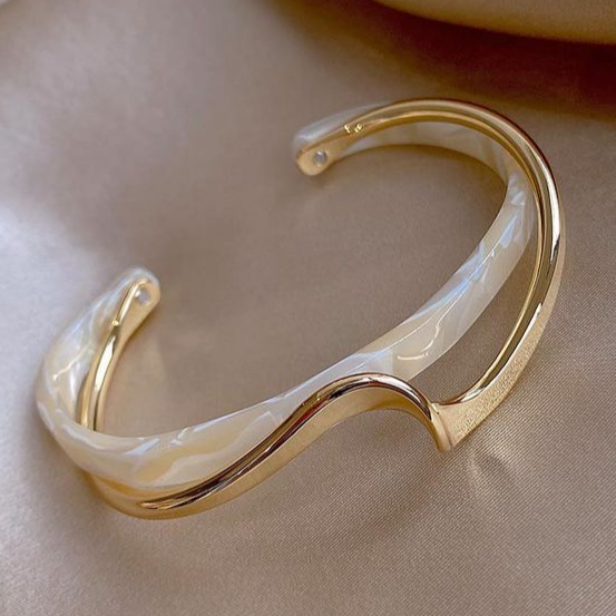 Elegant Gold Bracelet with White Opal Accents